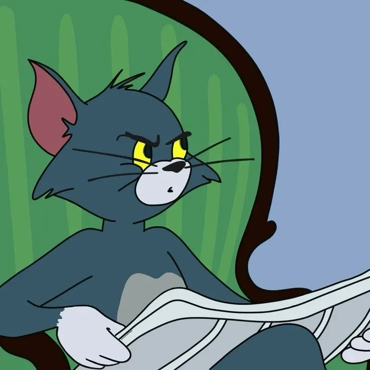 Meme mèo Tom đọc báo biểu cảm chăm chú